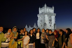 The captain of Afghanistan's national women football team Farkhunda Muhtaj (C) poses for a portrait with teammates at the Belem Tower in Lisbon, Portugal,
