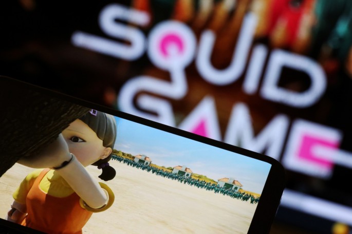 The Netflix series "Squid Game" is played on a mobile phone in this picture illustration taken
