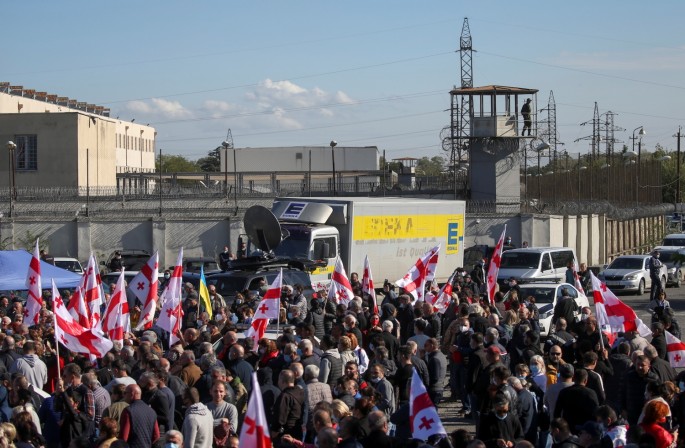 Supporters of Georgian ex-president Mikheil Saakashvili, who called for post-election street protests and was arrested upon his arrival in Georgia despite facing imprisonment, hold a rally near a jail in Rustavi, Georgia