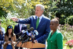New York City Mayor and former Democratic U.S. Presidential candidate Bill de Blasio, with his wife Chirlane McCray, speaks at a news conference after announcing that he was ending his presidential bid in New York, U.S.,