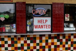 A help wanted sign is posted at a taco stand in Solana Beach, California, U.S.