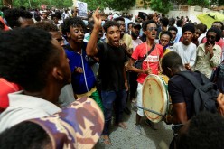 Sudanese take part in a march against the Rapid Support Forces, who they blame for a raid on protesters who had camped outside the defense ministry during the 2019 revolution, in Khartoum,