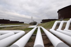 Pipelines run to Enbridge Inc.'s crude oil storage tanks at their tank farm in Cushing,