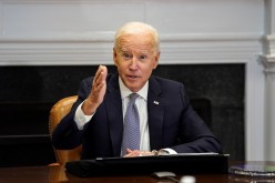 U.S. President Joe Biden speaks as he participates in the virtual CEO Summit on Semiconductor and Supply Chain Resilience from the Roosevelt Room at the White House in Washington, U.S.