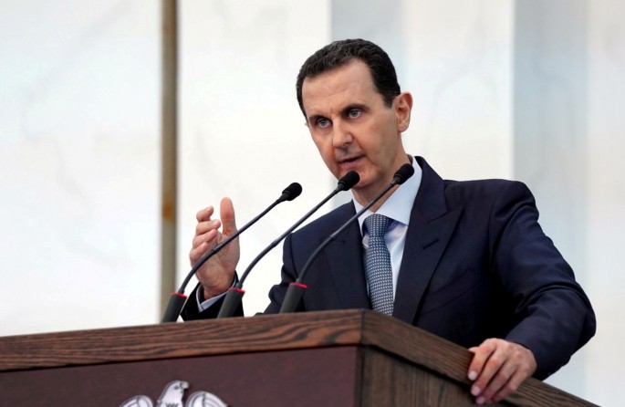 Syria's President Bashar al-Assad addresses the new members of parliament in Damascus, Syria in this handout released by SANA