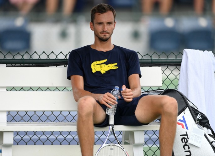 Oct 6, 2021; Indian Wells, CA, USA; Daniil Medvedev (RUS) takes a break on the practice courts during the BNP Paribas Open at the Indian Wells Tennis Garden.