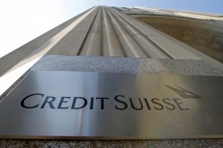 A Credit Suisse sign is seen on the exterior of their Americas headquarters in the Manhattan borough of New York City,