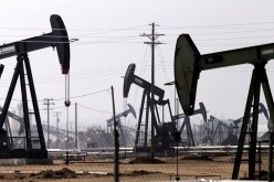 Oil drills are pictured in the Kern River oil field in Bakersfield, California