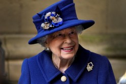 Britain's Queen Elizabeth leaves after a Service of Thanksgiving to mark the Centenary of the Royal British Legion at Westminster Abbey, London, Britain