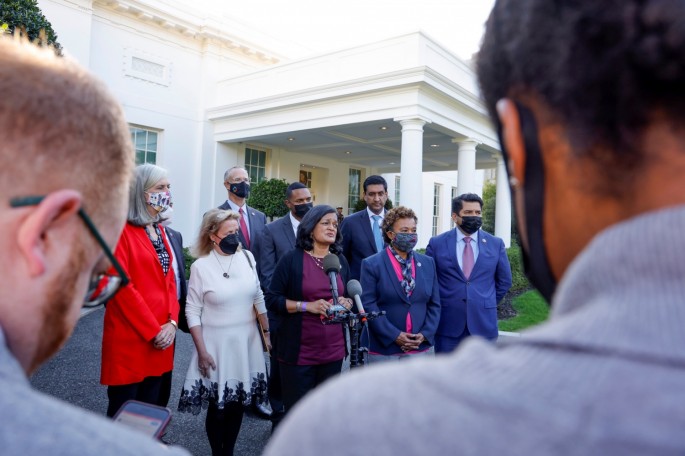 U.S. Representative Pramila Jayapal (D-WA) leads a group of Democratic members of Congress out of the West Wing to speak to reporters after meeting with President Joe Biden about infrastructure legislation at the White House in Washington, U.S