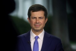 U.S. Secretary of Transportation Pete Buttigieg gives a live interview to the news media outside of the White House in Washington, U.S.