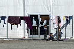 A structure housing Afghan evacuees is seen at Joint Base McGuire-Dix-Lakehurst, New Jersey, which has surged housing and supplies to host more than 9,300 Afghans awaiting resettlement in the United States, 