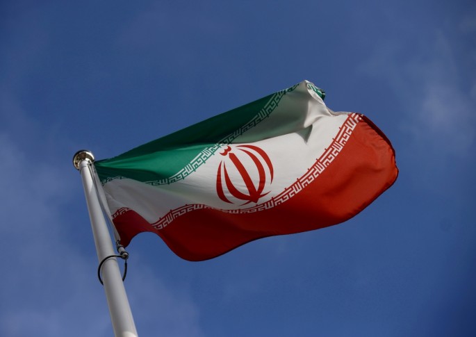 The Iranian flag waves in front of the International Atomic Energy Agency (IAEA) headquarters, before the beginning of a board of governors meeting, in Vienna, Austria