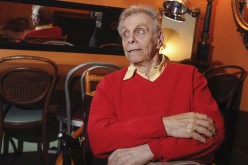 Comedian Mort Sahl speaks to people off camera in a private room at the Throckmorton Theatre in Mill Valley, California