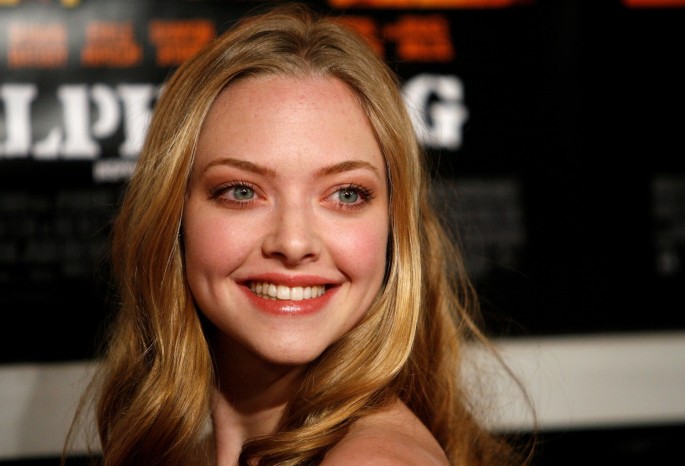 Cast member Amanda Seyfried smiles at the world premiere of "Alpha Dog" at the Arclight theater in Los Angeles