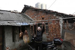 The Chinese tradition of curing pork is being blamed for the thick smog that engulfs the city.