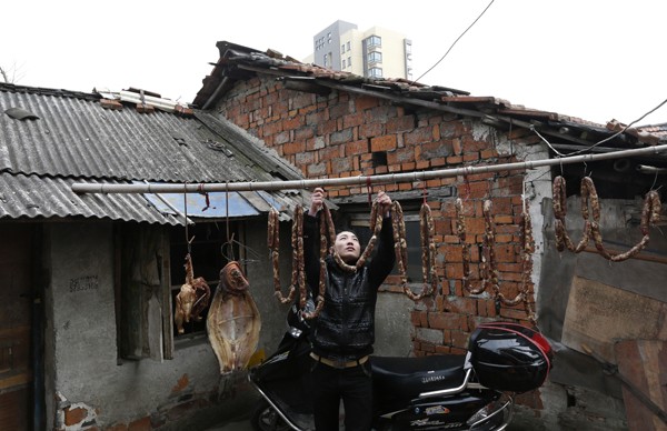 The Chinese tradition of curing pork is being blamed for the thick smog that engulfs the city.