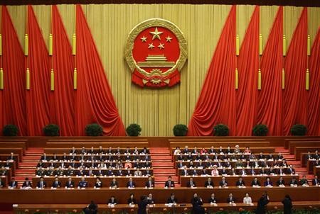 Delegates attend the fourth plenary meeting of the National People's Congress (NPC). 
