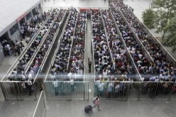 Beijing subway lines can be long during the rush hour.