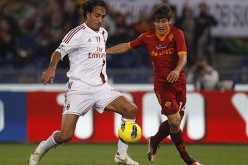 Alessandro Nesta (L) playing for AC Milan in their match against AS Roma.