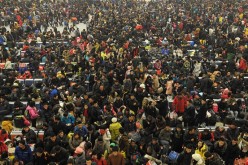 Passengers at Hankou Railway Station in Wuhan during Spring Festival.