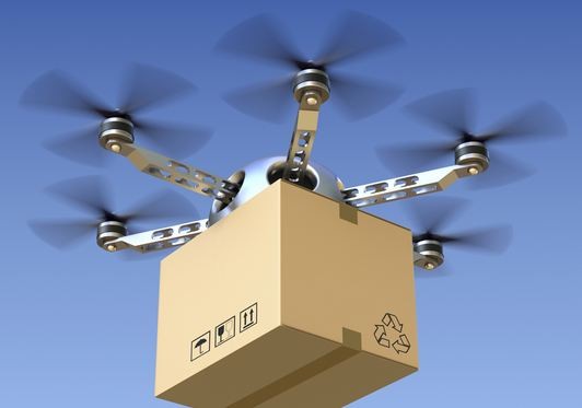 Not allowed: drone carrying package.