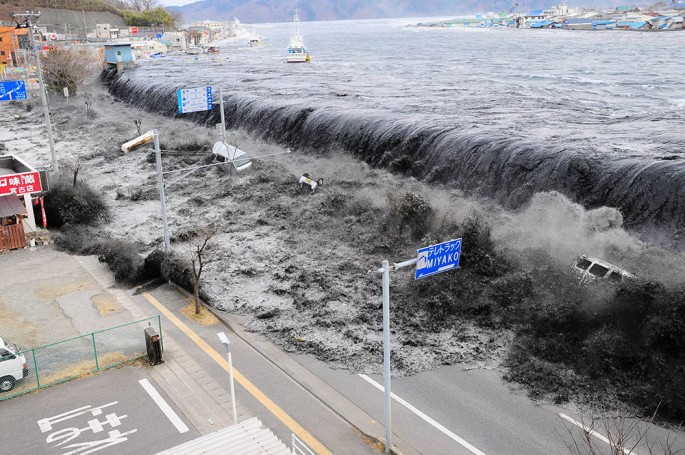 A wave approaches Miyako City after a magnitude 8.9 earthquake struck the area March 11, 2011.