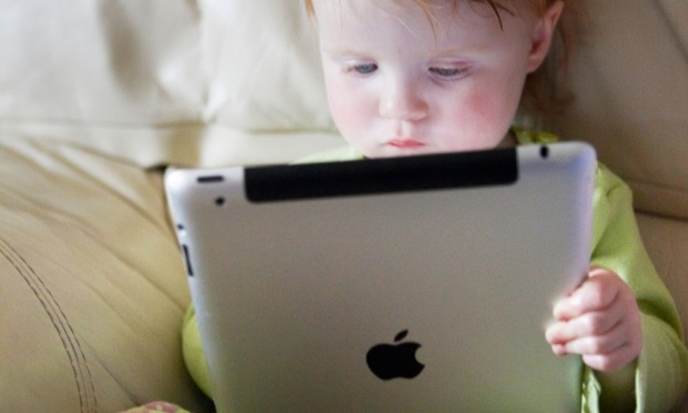 Toddlers using tablets