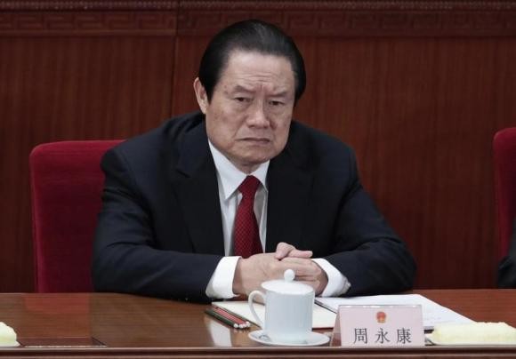 China's former Politburo Standing Committee Member Zhou Yongkang was arrested for corruption in Dec. 2014, so even if the proposal passes, it will not apply to him. 