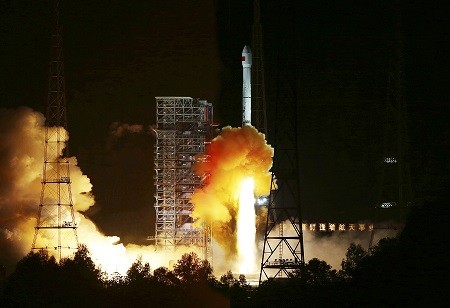An experimental spacecraft lifts off from the launch pad at the Xichang Satellite Launch Center in Sichuan Province.