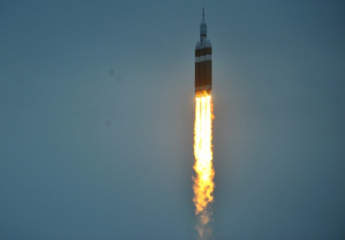 A rocket carrying the Orion spacecraft blasts off from Cape Canaveral Air Force Station, Florida, Dec. 5, 2014. 