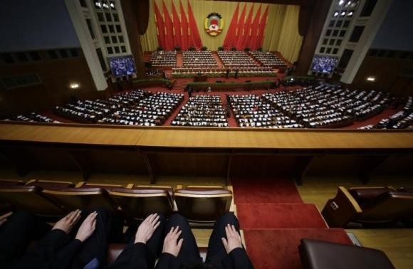 Many people resign from their jobs at the Great Hall of the People after years of working.