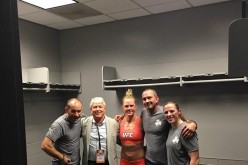 Holly Holm with her coaches 