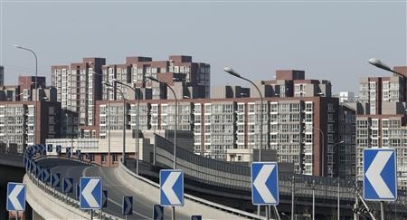 Apartments are seen from a street in Beijing. 