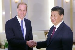 Prince William (L), Duke of Cambridge, meets President Xi Jinping at the Great Hall of the People in Beijing on March 2. 