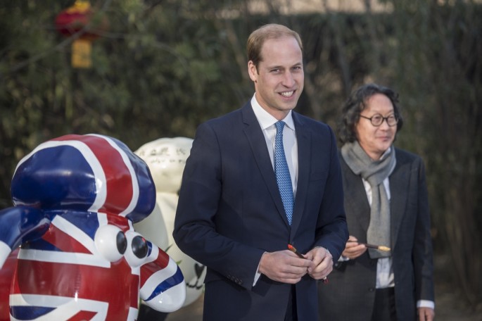 Prince William poses with a "Shaun the Sheep" sculpture at the British Ambassador’s residence in Beijing on Monday, March 2. 