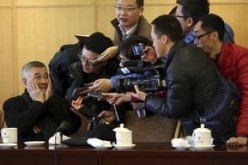 Actor Zhao Benshan is interviewed by the press people during the recent Chinese People's Political Consultative Conference meeting in Beijing.