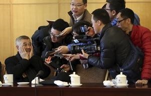 Actor Zhao Benshan is interviewed by the press people during the recent Chinese People's Political Consultative Conference meeting in Beijing.
