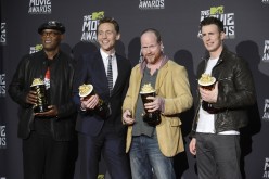 Director Joss Whedon (2nd from R) and cast members Samuel L. Jackson (L), Tom Hiddleston and Chris Evans (R) pose with their awards for movie of the year for 