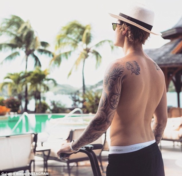 Justin Bieber Showing Off Sculpted Physique