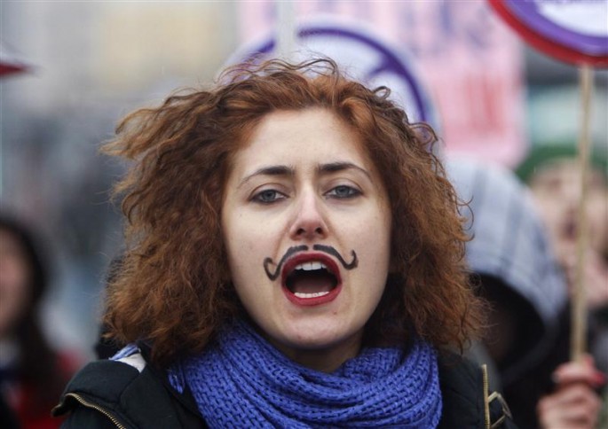 A woman shouts slogans during a demonstration to mark the International Women's Day in Istanbul, March 6, 2010. 