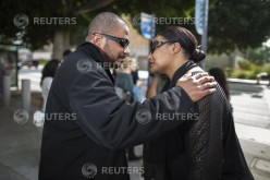 Nona Gaye (R) and Marvin Gaye III, daughter and son of late singer Marvin Gaye, leave court in Los Angeles, California March 10, 2015. Heirs of the late soul singer Marvin Gaye won a $7.4 million judgment on Tuesday against recording stars Robin Thicke an