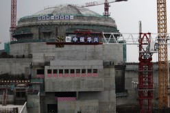 Workers stand in front of a nuclear reactor in Taishan in Guangdong Province. 