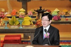Wang Zuo'an, director of the State Administration for Religious Affairs, gives a message at the opening ceremony of the Third World Buddhist Forum in Hong Kong in April 2012.