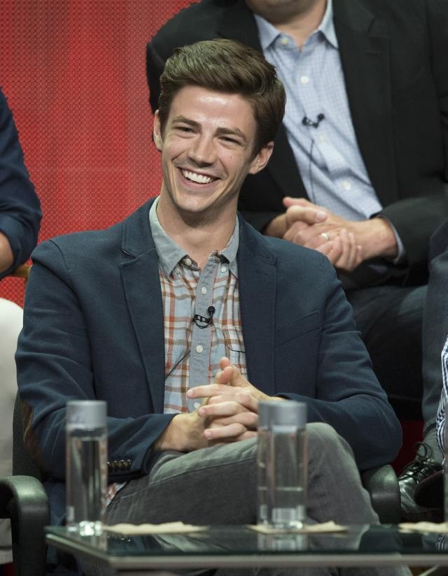 Cast member Grant Gustin attends a panel for The CW television series "The Flash"