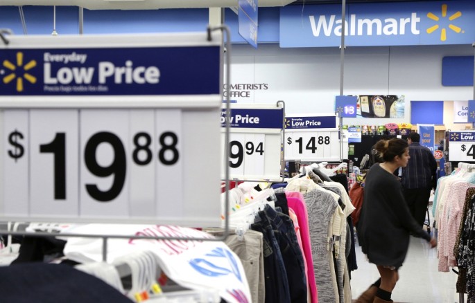 A woman shops at a Wal-Mart store in California. The retail chain announced on Wednesday that they will be opening 30 new stores in China this year.