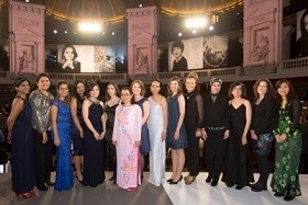 Women awardees pose for pictures during the awarding ceremonies held at the Grand Amphitheatre of the Sorbonne University in Paris.