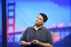 Terry Myerson, vice president of the operating systems group at Microsoft, speaks on stage during the company's 