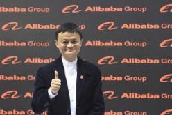 Alibaba founder and chairman Jack Ma poses for the media while touring the CeBIT trade fair in Hannover, March 16, 2015.
