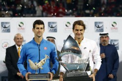 Roger Federer (R) of Switzerland and Novak Djokovic of Serbia